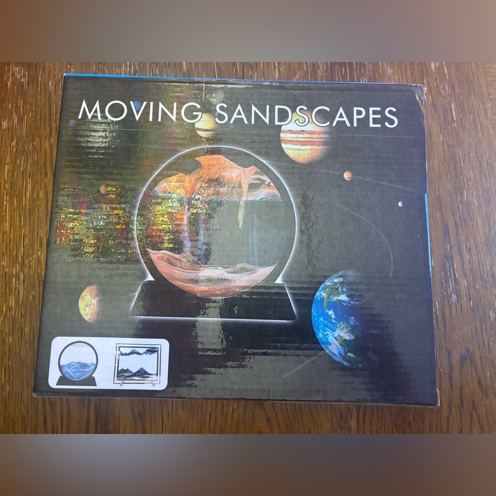 Moving Sandscapes Globe